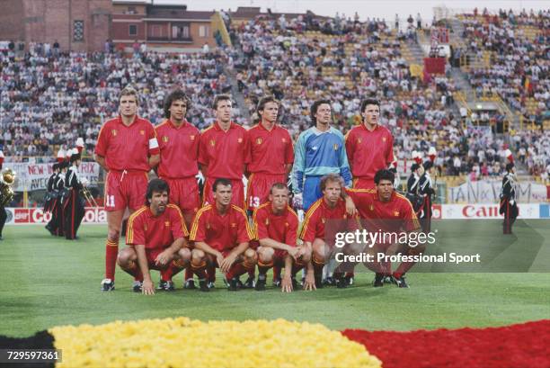 View of the Belgium international football team posed together on the pitch prior to their Round of 16 match with England in the 1990 FIFA World Cup...