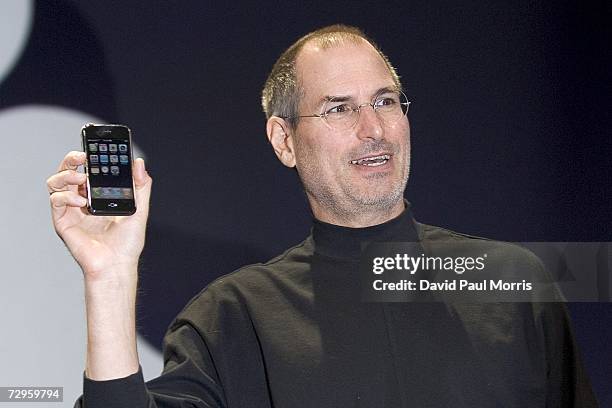 Apple CEO Steve Jobs holds up the new iPhone that was introduced at Macworld on January 9, 2007 in San Francisco, California. During the keynote Jobs...