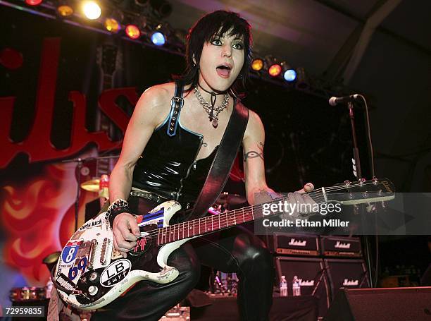 Joan Jett performs with her band Joan Jett and the Blackhearts at the Gibson booth at the Las Vegas Convention Center during the 2007 International...