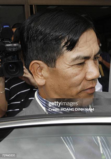 Myanmar's Foreign Minister Nyan Win arrives at the international airport of the Philippines' central city of Cebu, 10 January 2007 to attend the...