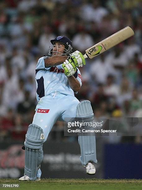 Andrew Johns of the Blues plays a shot during the Twenty20 Big Bash match between the New South Wales Blues and the Tasmanian Tigers at Telstra...
