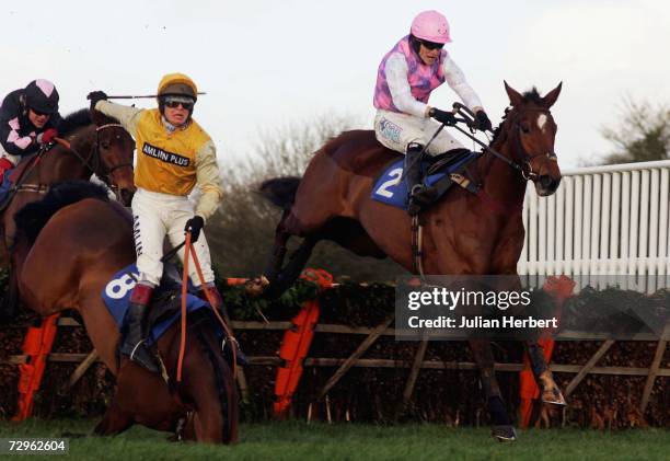 Sam Thomas and Fredensborg pass the falling Richard Johnson and Lead On to land Division One of The betfredcasino.com Maiden Hurdle Race run at...