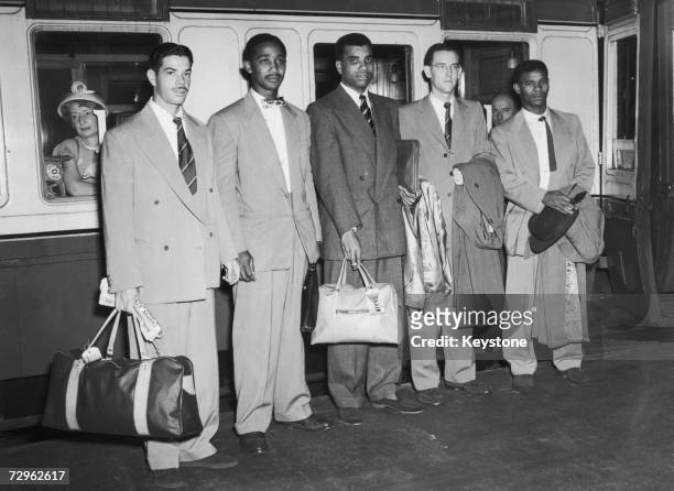 Members of the West Indian cricket team at St. Pancras station on their way to Australia, 13th September 1951. Left to right: Kenneth Rickards , Sir...