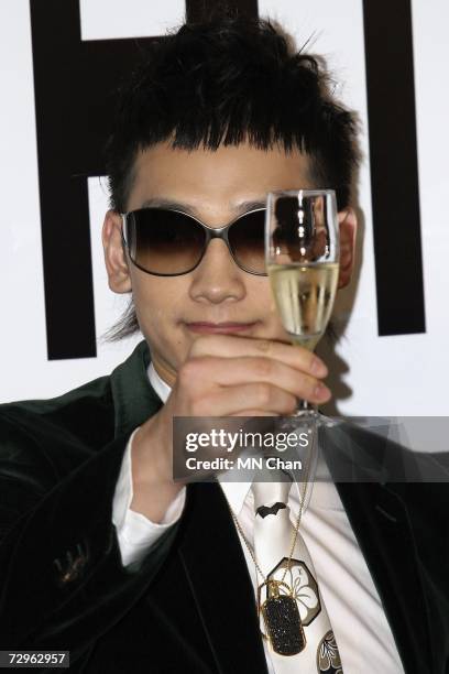 South Korean pop singer Rain toasts during a press conference to announce his 'Rain's Coming 06/07 Rain World Tour', at Renaissance Harbourview Hotel...