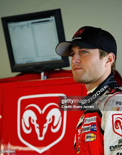 Kasey Kahne, driver of the Dodge Dealers/UAW Dodge, in the garage during NASCAR testing at Daytona International Speedway on January 10, 2007 in...