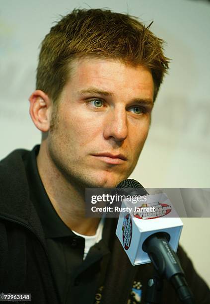 Jamie McMurray, driver of the Crown Royal Ford, speaks with the media during NASCAR testing at Daytona International Speedway on January 10, 2007 in...