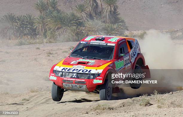 France's Stephane Peterhansel jumps during the fifth stage of the 29th Dakar between Ouarzazate and Tan Tan, 10 January 2007. Spaniard Carlos Sainz...