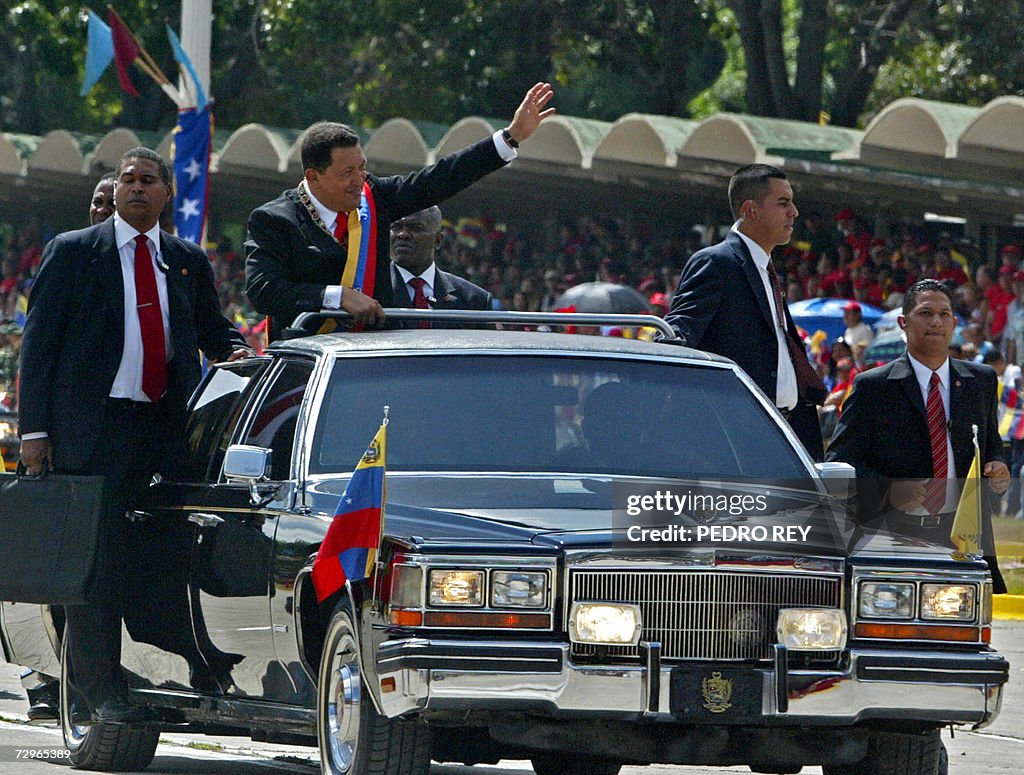 Venezuela's President Hugo Chavez waves