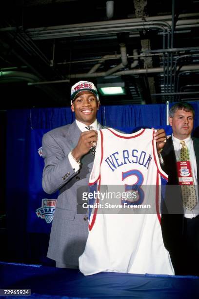 Allen Iverson of the Philadelphia 76ers poses for a photo after being selected in the first round of the 1996 NBA Draft held in New York, New York....