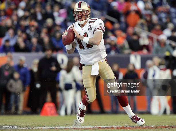 Alex Smith of the San Francisco 49ers passes the ball during the game against the Denver Broncos at Invesco Field at Mile High on December 31, 2006...