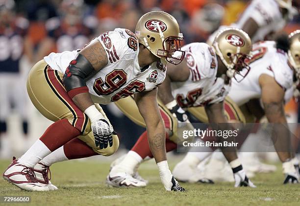 Melvin Oliver of the San Francisco 49ers gets ready on the line of scrimmage during the game against the Denver Broncos at Invesco Field at Mile High...