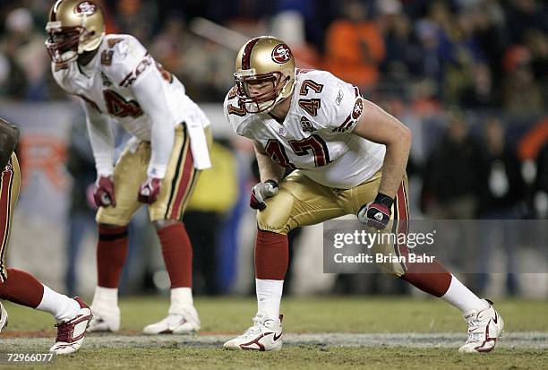 Billy Bajame of the San Francisco 49ers gets ready to move at the snap during the game against the Denver Broncos at Invesco Field at Mile High on...