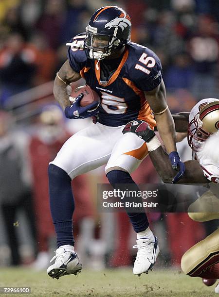 Brandon Marshall of the Denver Broncos carries the ball during the game against the San Francisco 49ers at Invesco Field at Mile High on December 31,...