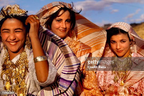 Portrait of young women wearing the traditional Berber clothing and jewelry during a folk festival on April, 2000 in Kabaw, Libya.