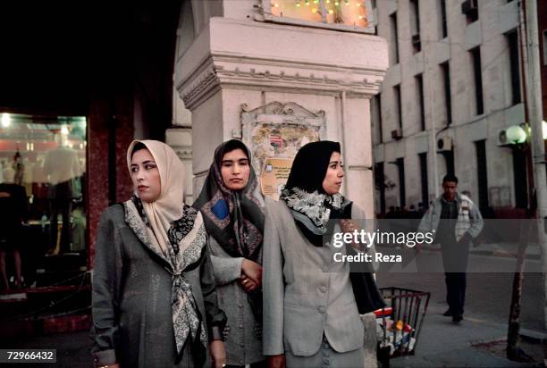 Veiled women walk down the street on March, 2000 in Tripoli, Libya.