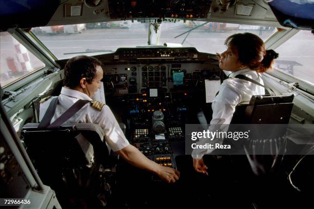 Aysh Gammo, the first Libyan woman airplane pilot gets ready for a flight on March, 2000 in Tripoli, Libya.