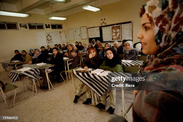 Young women attend class at the military school for young Libyan women on in Tripoli. March, 2000 in Tripoli, Libya.