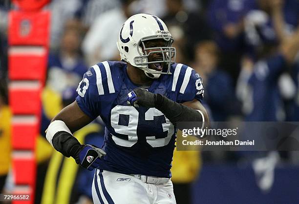 Dwight Freeney of the Indianapolis Colts celebrates a defensive play against the Kansas City Chiefs during their AFC Wild Card Playoff Game January...