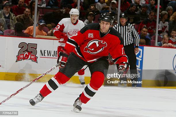 Michael Rupp of the New Jersey Devils skates against the Detroit Red Wings at Continental Airlines Arena on December 16, 2006 in East Rutherford, New...