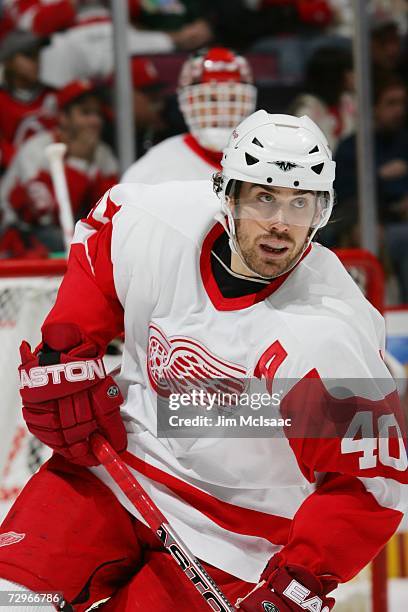 Henrik Zetterberg of the Detroit Red Wings skates against the New Jersey Devils at Continental Airlines Arena on December 16, 2006 in East...