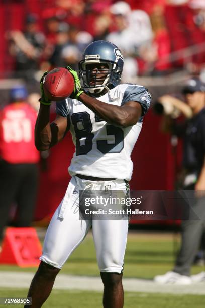 Wide receiver Deion Branch of the Seattle Seahawks warms up before the game against the Tampa Bay Buccaneers at Raymond James Stadium on December 31,...