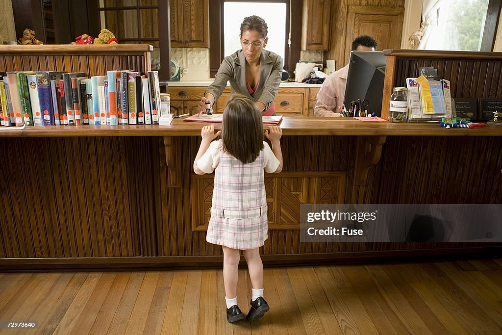 Young girl in a library