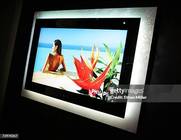 An Ambilight flat television adorned with 2,200 diamonds is seen at the Philips Electronics booth at the Las Vegas Convention Center during the 2007...