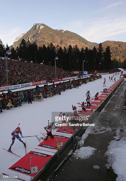 Competitors in action at the shooting area during the men's 4x7.5 km relay in the Biathlon World Cup on January 11, 2007 in Ruhpolding, Germany.