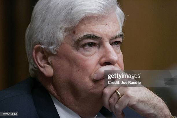 Senate Foreign Relations Committee member Sen. Christopher Dodd, listens as Secretary of State Condoleezza Rice testifies on the topic of "The...