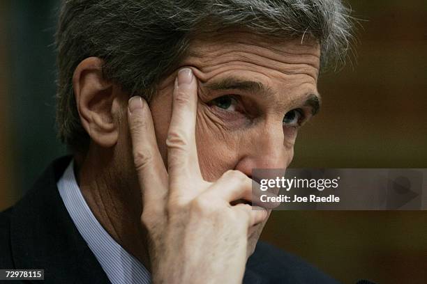 Senate Foreign Relations Committee member Sen. John Kerry , listens as Secretary of State Condoleezza Rice testifies on the topic of "The...