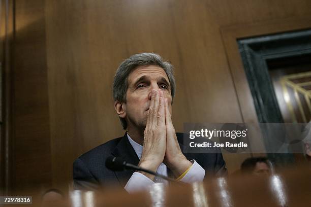 Senate Foreign Relations Committee member Sen. John Kerry , listens as Secretary of State Condoleezza Rice testifies on the topic of "The...