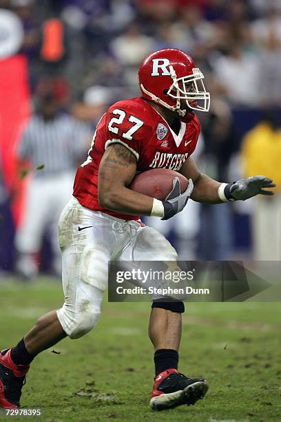 Raymell Rice of the Rutgers Scarlet Knights carries the ball during the Texas Bowl against the Kansas State Wildcats on December 28, 2006 at Reliant...