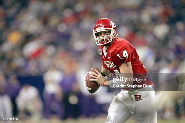 Quarterback Mike Teel of the Rutgers Scarlet Knights looks to pass against the Kansas State Wildcats during the Texas Bowl on December 28, 2006 at...