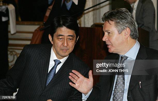 Belgium's Foreign Minister Karel de Gucht talks with Japanese Prime minister Shinzo Abe at the Egmont Palace in Brussels 11 January 2007. Japanese...