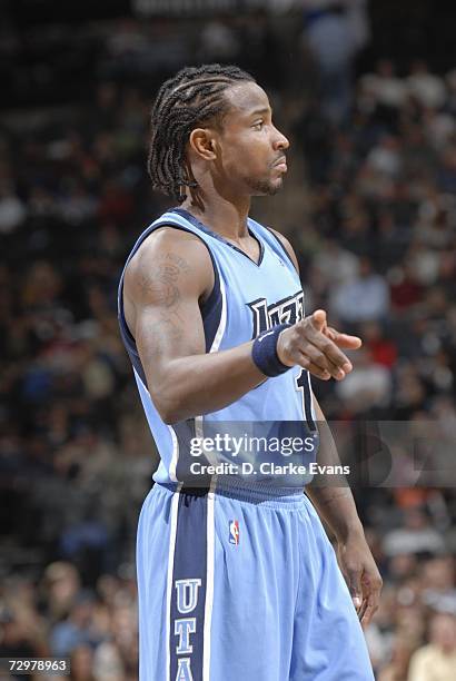 Dee Brown of the Utah Jazz points during a game against the San Antonio Spurs at the AT&T Center on December 28, 2006 in San Antonio, Texas. The...