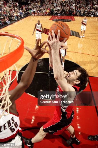Jorge Garbajosa of the Toronto Raptors attempts to rebound the ball near Zach Randolph of the Portland Trail Blazers on December 22, 2006 at the Rose...