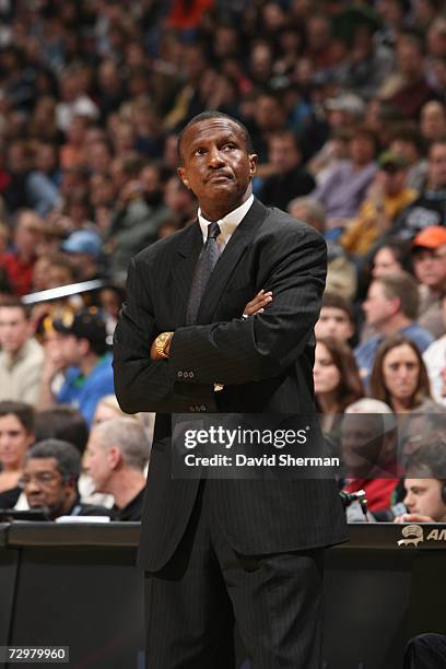 Head coach Dwane Casey of the Minnesota Timberwolves stands on the sidelines during a game against the Seattle SuperSonics at the Target Center on...