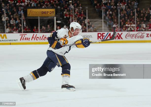 Brian Campbell of the Buffalo Sabres shoots the puck against the Ottawa Senators at Scotiabank Place on January 3, 2007 in Ottawa, Ontario, Canada....