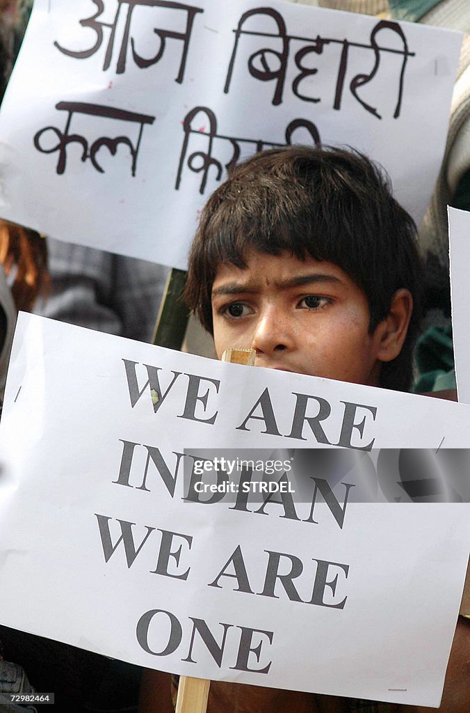 An Indian Hindi speaking child carries a