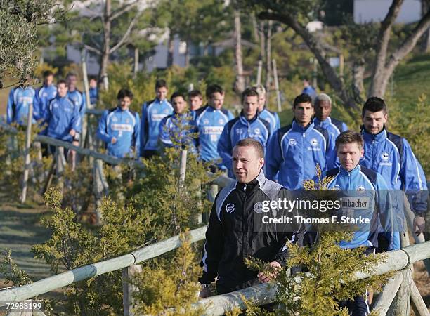 Assistant coach Frank Geideck walks in front of the Bielefeld team during the Arminia Bielefeld training camp on January 12, 2007 in Huelva, Spain.