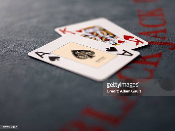 playing cards on blackjack table in casino, close-up - blackjack stock pictures, royalty-free photos & images