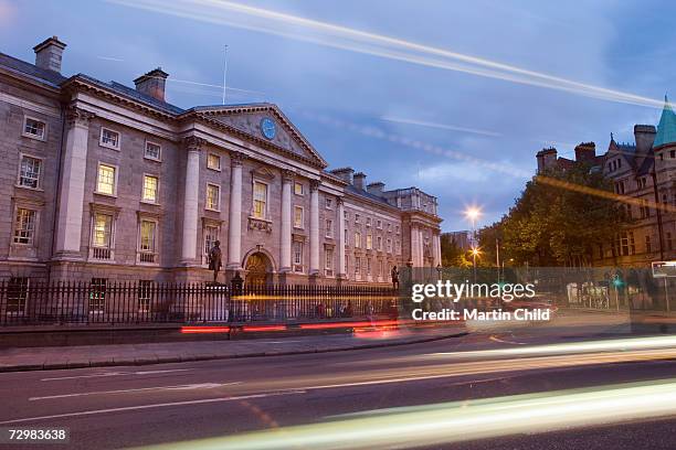 ireland, dublin, trinity college at dusk - trinity college stock pictures, royalty-free photos & images