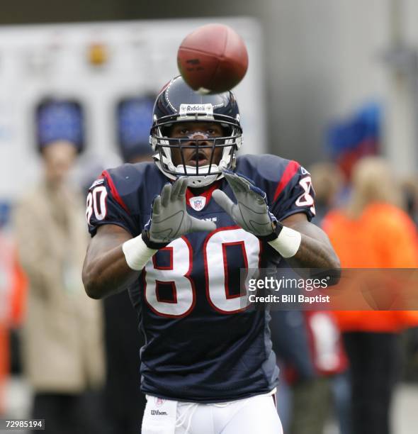 Wide receiver Andre Johnson of the Houston Texans catches a ball before the game against the New England Patriots at Gillette Stadium on December 17,...