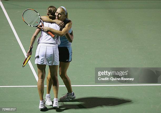 Elena Vesnina and Elena Likhovtseva of Russia celebrate winning the doubles final against Anabel Medina Garrigues and Virginia Ruano Pascual of Spain...