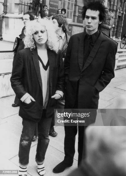 Former Sex Pistols bassist Sid Vicious with his girlfriend Nancy Spungen outside Marylebone Magistrates Court, London, 1978.