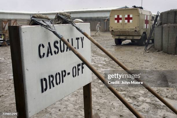 Mops used to clean blood from the emergency room floor hang behind a U.S. Military hospital January 12, 2007 in Anbar province, Ramadi, Iraq. U.S....