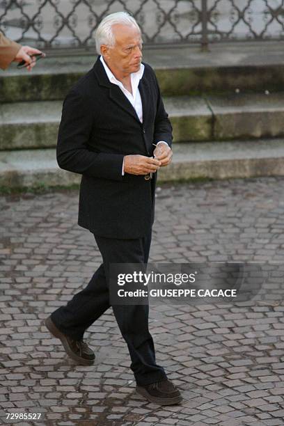 Italian designer Giorgio Armani leaves San Martin church after Carlo Ponti's funeral 12 January, 2007 in Magenta where the producer was born 94 years...