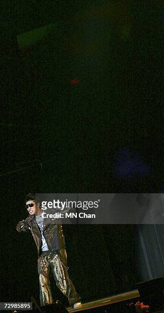 South Korean pop singer Rain performs during his concert at AsiaWorld Expo Arena on January 12, 2007 in Hong Kong, China. Rain starts his second...