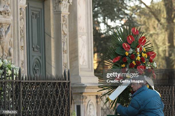 Florist arrives with flowers at the funeral of former Italian director Carlo Ponti at San Martin church on January 12, 2007 in Magenta, Italy....