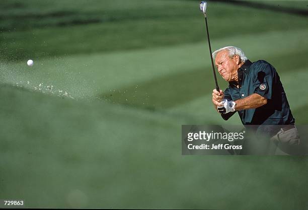 Arnold Palmer chips the ball during the Bob Hope Chrysler Classic at the Indian Wells Country Club in Indian Wells, California.Mandatory Credit: Jeff...